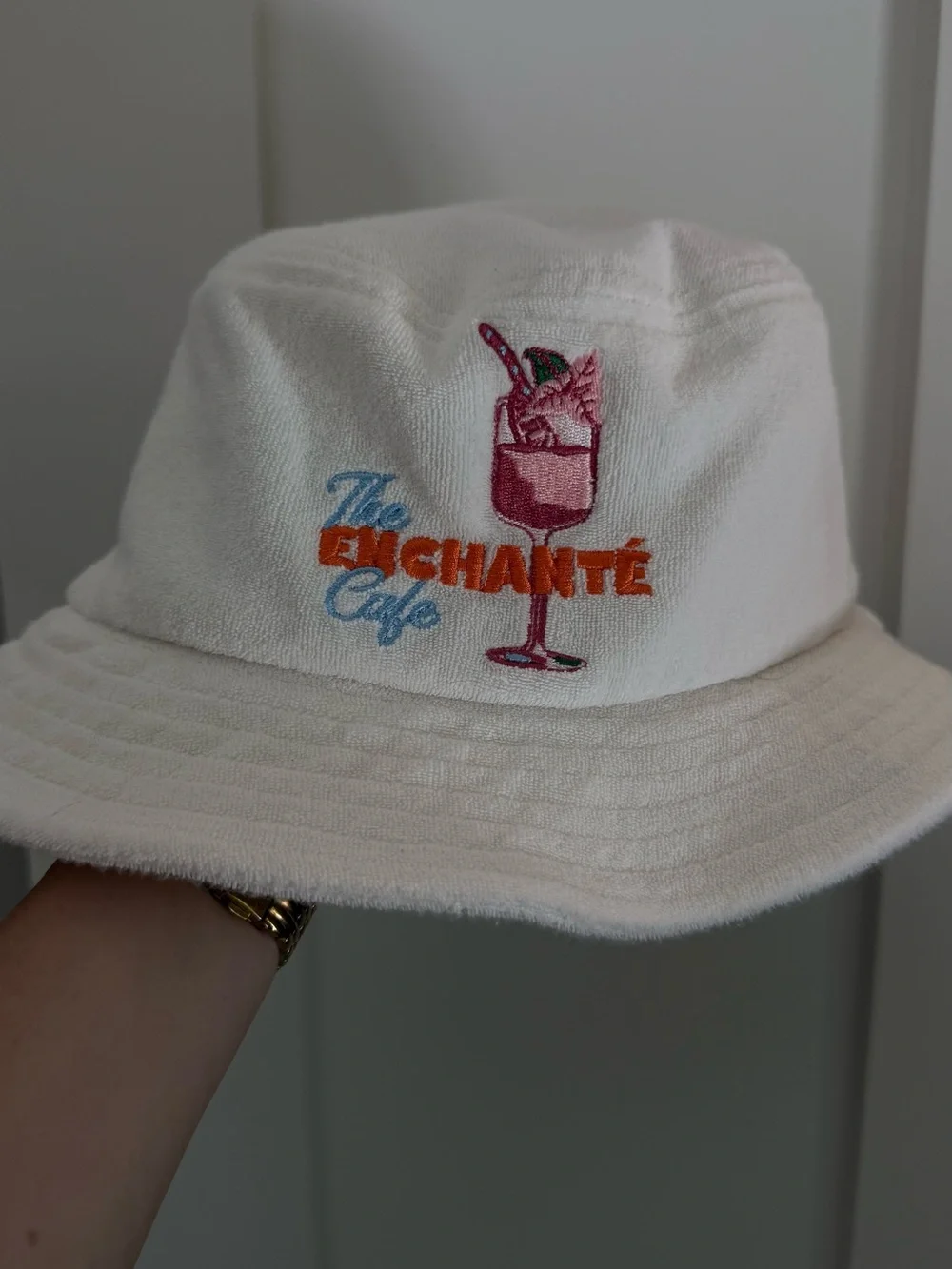The Enchanté Cafe bucket hat in white terry cloth